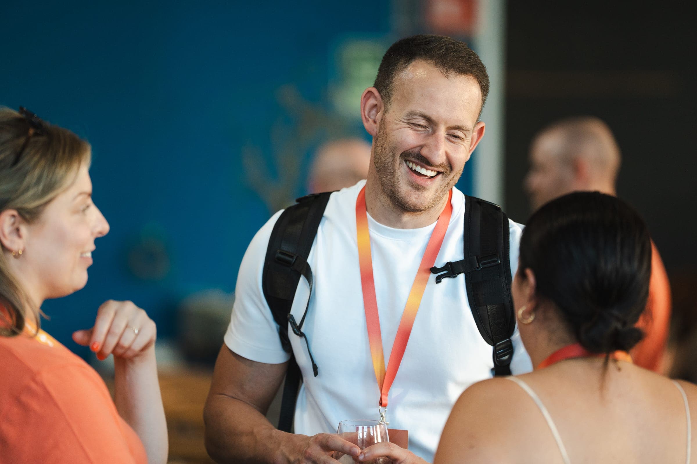 Attendees laughing together during a break at The PPC Summit 2026